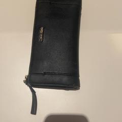 Pénztárca, amint azt Van der Valk Hotel Eindhoven - Best az iLost segítségével jelentette.