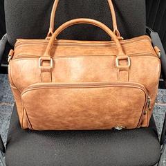 Saco met inhoud, como reportado por Connexxion Haarlem AML utilizando o iLost