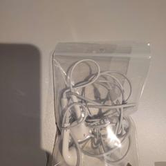 Earphones, como reportado por Padualaan 101 utilizando o iLost