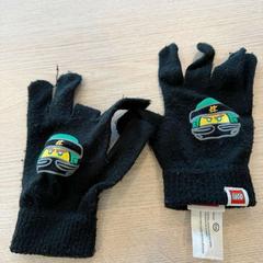 Gants lego, a été signalé par Van Heugten Tours utilisant iLost