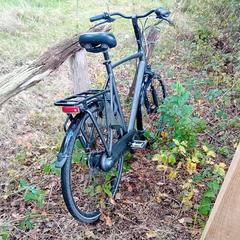 grijs zwarte herenfiets, iLost-i jakinarazi zaion moduan