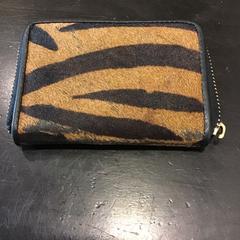 Pasjesetui, som rapportert av Qbuzz U-OV ved bruk av iLost