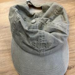 Mössa groen met opdruk 'surf', rapporterat av Gemeente Zevenaar med iLost
