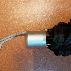 Paraigües plegable noir, segons ha informat TCL mitjançant iLost