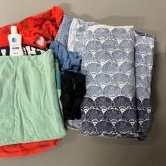 Towel and t shirt, segons ha informat Silver Sands Beach mitjançant iLost