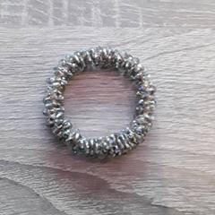 Pulseira, como reportado por EBS Tramplein utilizando o iLost