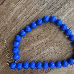 Blauwe ketting, som rapporterats till iLost