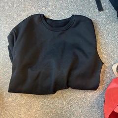 Kleding - Trui Zwart, como reportado por Regio Oost-Vlaanderen utilizando o iLost