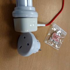 Adattatore, come riportato da Inntel Hotels Amsterdam Centre utilizzando iLost