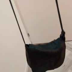 Zwarte handtas, som rapporterats till iLost