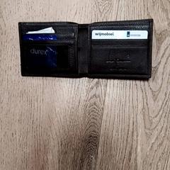 Peněženka Barcan, jak nahlášeno RRReis Trein Amersfoort / Ede-Wageningen pomocí iLost