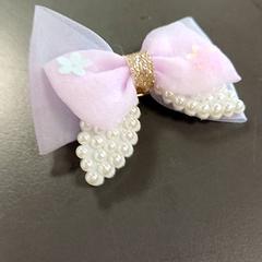 Pulseira 1 pince et 1 élastique avec papillon, segundo informou IKEA Strasbourg usando iLost