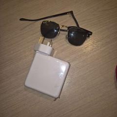 Sunglasses & Charger, as reported by Amsterdam ID Aparthotel using iLost