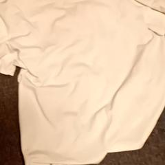 Camisa, segundo informou Mövenpick Hotel Amsterdam City Centre usando iLost