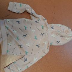 Dessuadora amb caputxa boa rose, segons ha informat TCL mitjançant iLost