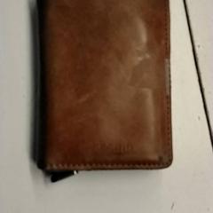 Plånbok Szymański, rapporterat av HTM med iLost