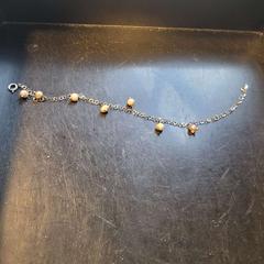 Pulseira zilver met kraaltjes, segundo informou Breda University of Applied Sciences Mgr. Hopmansstraat usando iLost