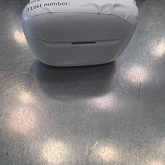 Écouteurs sans fil White, a été signalé par MEININGER Hotel Bruxelles Gare du Midi utilisant iLost