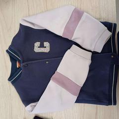 Gillet enfant, como reportado por IKEA Liège utilizando o iLost