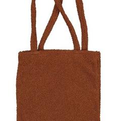 Donker bruin tas met wol aan de buitenkant, ha sido reportado a iLost