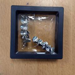 Fausses dents, a été signalé par Inntel Hotels Amsterdam Centre utilisant iLost