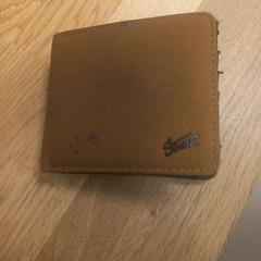 Carteira de homem com documentos, as reported by IKEA Braga using iLost