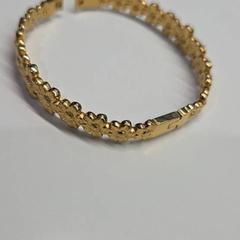 Armbånd goudkleurig, bloemenmotief, som rapportert av Stad Hasselt ved bruk av iLost