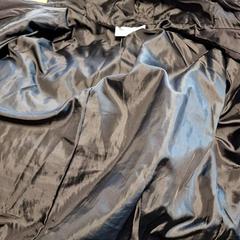 Jacke Lange zwarte, gemeldet von Gemeente Roermond über iLost