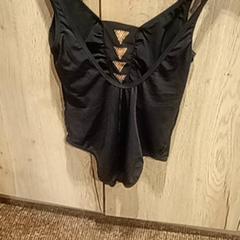 Vestit de bany & Sandàlies, segons ha informat Van der Valk Hotel Apeldoorn - De Cantharel mitjançant iLost