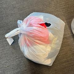 Plastic zak wit, groen, segons ha informat Centraal magazijn mitjançant iLost