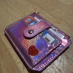 Roze portemonnee, som rapportert til iLost