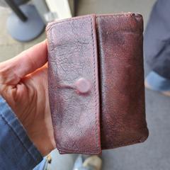 Bruine portefeuille, som rapportert til iLost