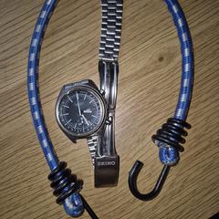 Seiko horloge en snelbinder, como reportado ao iLost