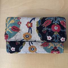 Portmonee, textiele buitenkant, jak bylo nahlášeno na iLost