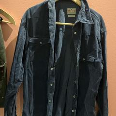 Skjortor dark blue, rapporterat av Conscious Hotel Vondelpark med iLost