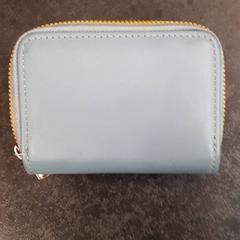 Peňaženka, ako bolo nahlásené Rotterdam The Hague Airport pomocou iLost