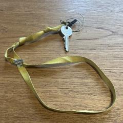 Sleutel aan geel koord, ako bolo nahlásené iLost