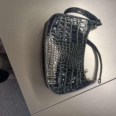 Håndveske Zwart, som rapportert av Gebo Tours ved bruk av iLost