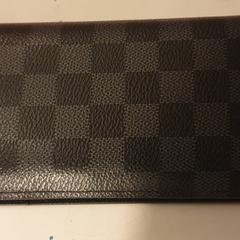 Portemonnee, som rapportert til iLost