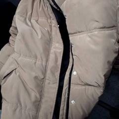 Jas Beige/bruine, zoals gemeld door Qbuzz Fryslân met iLost