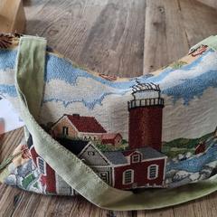 Tas met vuurtoren, en inhoud, gerapporteerd met iLost