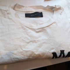 T skjorte, som rapportert av Inntel Hotels Utrecht Centre ved bruk av iLost