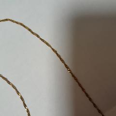 Halsband dorée, rapporterat av TCL med iLost