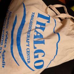 Sac toile en beige, a été signalé par TCL utilisant iLost