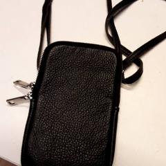 Bolsa de cuello, ha sido reportado por Qbuzz ZHN con iLost