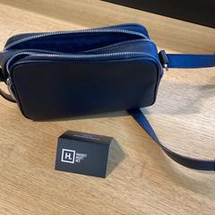 Bag Zwart, som rapportert av Stad Hasselt ved bruk av iLost