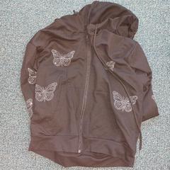 T shirt katoen, met vlinder glitters, amint azt RRReis Overijssel / Flevoland-IJsselmond az iLost segítségével jelentette.