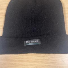 Cap Zwart Thermolate, come riportato da Pathé Amsterdam Noord utilizzando iLost