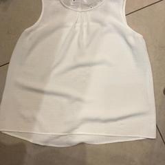 Blusa White, segundo informou Leonardo Royal Hotel Amsterdam usando iLost