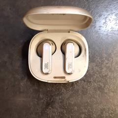 Draadloze oortjes in houder, gisa salatu by Rotterdam The Hague Airport iLost erabiliz